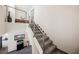 Modern staircase with gray carpeting and metal railings at 816 Loch Katrine Ave, Henderson, NV 89012