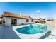 Relaxing kidney-shaped pool with patio and gazebo at 8233 Ducharme Ave, Las Vegas, NV 89145