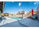 Inviting kidney-shaped pool with patio and gazebo at 8233 Ducharme Ave, Las Vegas, NV 89145