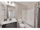 Clean bathroom with tub shower combo, vanity, and mirror at 8415 Quarentina Ave, Las Vegas, NV 89149