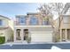 Two-story house with attached garage and balcony at 8415 Quarentina Ave, Las Vegas, NV 89149