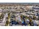 Aerial view of houses in a community, showing surrounding landscape and mountain views at 9225 Evergreen Canyon Dr, Las Vegas, NV 89134