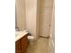 Clean bathroom with a toilet, sink, and vanity at 9553 Madsen Glen Ct, Las Vegas, NV 89166