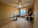 Bright bedroom featuring a workspace and electronic drum kit at 9553 Madsen Glen Ct, Las Vegas, NV 89166