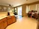 Kitchen with wooden cabinets and tile floor at 9553 Madsen Glen Ct, Las Vegas, NV 89166