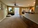 Living room with kitchen and backyard view at 9553 Madsen Glen Ct, Las Vegas, NV 89166