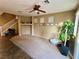 Spacious living room with tile and carpet flooring at 9553 Madsen Glen Ct, Las Vegas, NV 89166