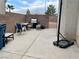 Concrete patio with grill and seating area at 9553 Madsen Glen Ct, Las Vegas, NV 89166