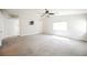 Large bedroom with ceiling fan, carpet flooring, and ample natural light at 9757 Marcelline Ave, Las Vegas, NV 89148