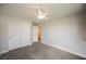 Spacious bedroom featuring ceiling fan and ample closet space at 9757 Marcelline Ave, Las Vegas, NV 89148