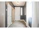 Modern entryway with gray walls and wood-look floors at 9757 Marcelline Ave, Las Vegas, NV 89148