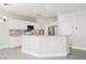 Modern kitchen featuring white cabinets, granite countertops, and stainless steel appliances at 9757 Marcelline Ave, Las Vegas, NV 89148