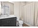 Bathroom with a vanity, toilet, and a shower-tub combination at 11015 Sanctuary Cove Ct, Las Vegas, NV 89135