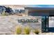 Community entrance sign surrounded by well-maintained landscaping, creating a welcoming first impression at 11015 Sanctuary Cove Ct, Las Vegas, NV 89135