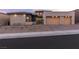 Stunning modern home with three-car garage and landscaped front yard at 11015 Sanctuary Cove Ct, Las Vegas, NV 89135