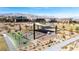 Community playground offering covered play structures, slides, and climbing features, surrounded by xeriscaping at 11015 Sanctuary Cove Ct, Las Vegas, NV 89135