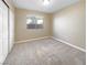 Bright bedroom with window and double closet at 1324 Royal Creek Ct, North Las Vegas, NV 89031