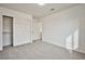 Spacious bedroom with double door closet and neutral decor at 1604 Tamborine Ct, Las Vegas, NV 89128