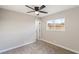 Bedroom with ceiling fan, window, and neutral decor at 1743 Eddingham Ct, Las Vegas, NV 89156