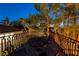 Secluded rooftop deck with a table and chairs, overlooking the backyard at 1920 Silver Ave, Las Vegas, NV 89102