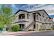 Two-story building exterior with stairs and landscaping at 2291 W Horizon Ridge Pkwy # 3214, Henderson, NV 89052