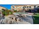 Community pool with seating and grassy areas at 2291 W Horizon Ridge Pkwy # 3214, Henderson, NV 89052