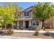 Two-story home with inviting front porch and landscaped yard at 3186 Del Terra Ave, Henderson, NV 89044