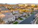 Aerial view of house and neighborhood with mountain backdrop at 409 Grand Augusta Ln, Las Vegas, NV 89144