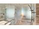 Modern bathroom with soaking tub and walk-in shower at 4381 W Flamingo Rd # 3216, Las Vegas, NV 89103