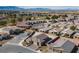 Aerial view of a residential neighborhood with mountain views at 4430 Deliza Ln, Pahrump, NV 89061