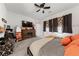 Bedroom with ceiling fan, TV, and dresser at 4430 Deliza Ln, Pahrump, NV 89061