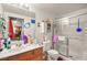 Bathroom with walk-in shower and wood vanity at 4655 Gold Dust Ave # 210, Las Vegas, NV 89120