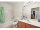 Clean bathroom with shower/tub combo and wood vanity at 4655 Gold Dust Ave # 210, Las Vegas, NV 89120
