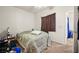 Second bedroom with a double bed and window at 4655 Gold Dust Ave # 210, Las Vegas, NV 89120