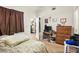 Small bedroom with a single bed and dresser at 4655 Gold Dust Ave # 210, Las Vegas, NV 89120