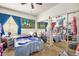 Bedroom with mirrored closet doors and tropical wall decor at 4655 Gold Dust Ave # 210, Las Vegas, NV 89120