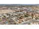 Aerial view of neighborhood with focus on home and pool at 5017 Wright View Dr, Las Vegas, NV 89120