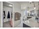 Main bathroom with double vanity, separate tub and shower, and linen closet at 5017 Wright View Dr, Las Vegas, NV 89120