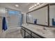 Bathroom with double vanity and shower/tub combo at 5017 Wright View Dr, Las Vegas, NV 89120