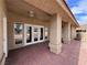 Covered patio with brick flooring and ceiling fan at 519 Crestway Rd, Henderson, NV 89015