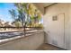 Private balcony with treetop and street views at 5655 E Sahara Ave # 2064, Las Vegas, NV 89142