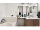Bathroom features a vanity, bathtub, and mirror at 5655 E Sahara Ave # 2064, Las Vegas, NV 89142