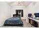 Bedroom with a queen bed, desk and ceiling fan at 5655 E Sahara Ave # 2064, Las Vegas, NV 89142
