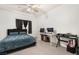 Bedroom with a queen bed, desk and ceiling fan at 5655 E Sahara Ave # 2064, Las Vegas, NV 89142