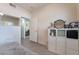 Bedroom with closet and view into dining area at 5655 E Sahara Ave # 2064, Las Vegas, NV 89142