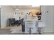Kitchen and dining area with breakfast bar and stools at 5655 E Sahara Ave # 2064, Las Vegas, NV 89142