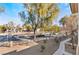 Front yard view of street, trees and walkway at 5655 E Sahara Ave # 2064, Las Vegas, NV 89142