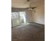 Carpeted bedroom with sliding door to patio at 7200 Pirates Cove Rd # 2025, Las Vegas, NV 89145