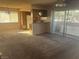 Spacious living room with kitchen and access to patio at 7200 Pirates Cove Rd # 2025, Las Vegas, NV 89145