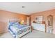 Inviting bedroom with a comfortable bed and beautiful furniture at 750 Willow Ave, Henderson, NV 89002